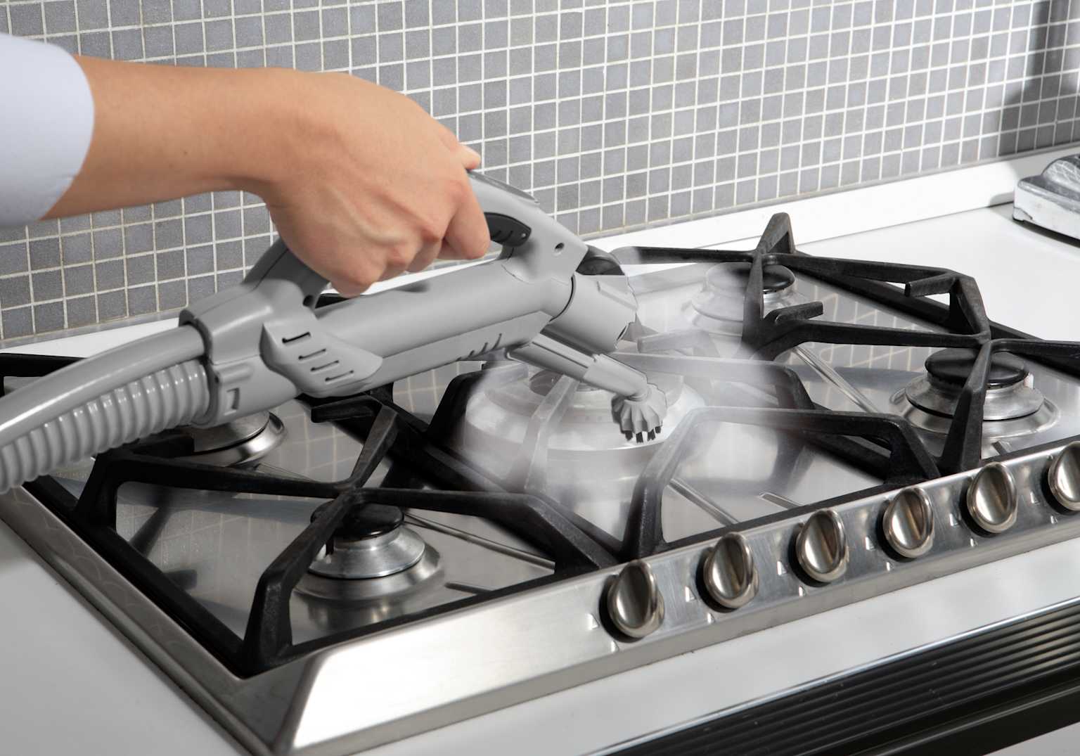 Technician repairing a cooking range